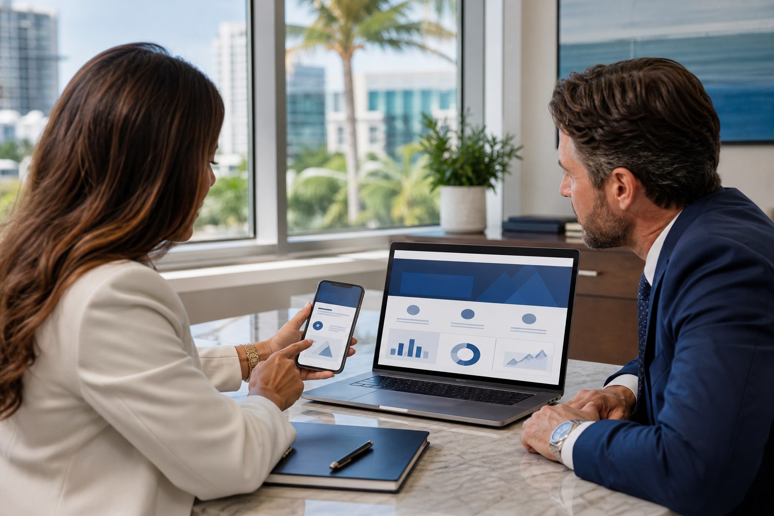 Attorney and marketing professional reviewing a mobile-friendly law firm website and campaign performance